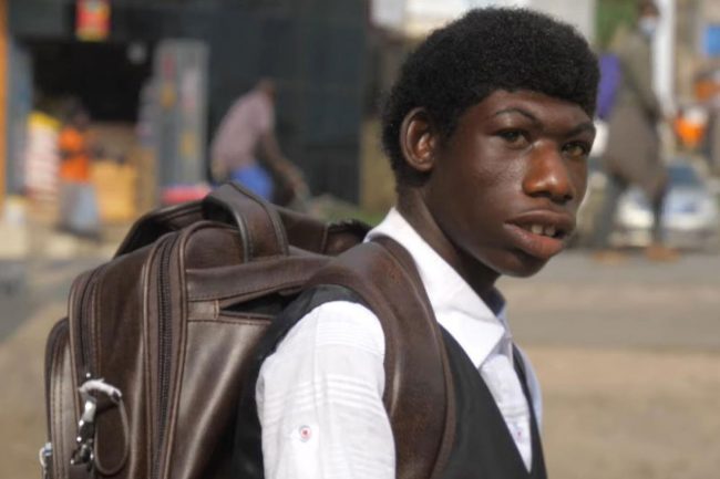 जंगलमा जनावरसँग हुर्किएका ‘रियल लाइफ मोगली’ सुट बुट लगाएर स्कुल जान थाले