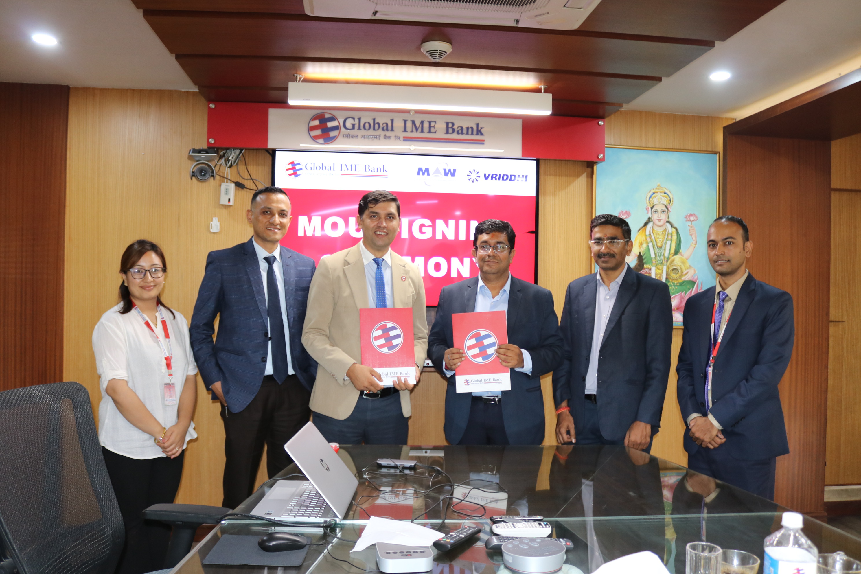 ग्लोबल आइएमई बैंक र एमएडब्लु वृद्धिबीच विद्युतीय सवारी कर्जा प्रवाहसम्बन्धी सम्झौता